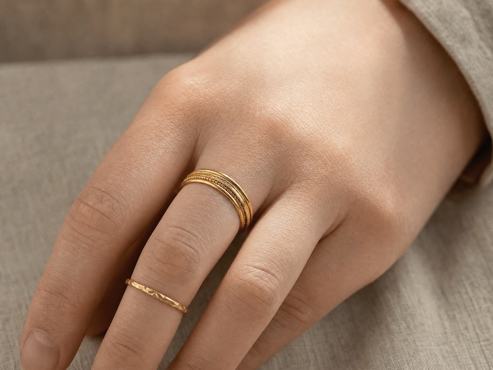 Gold rings on hand