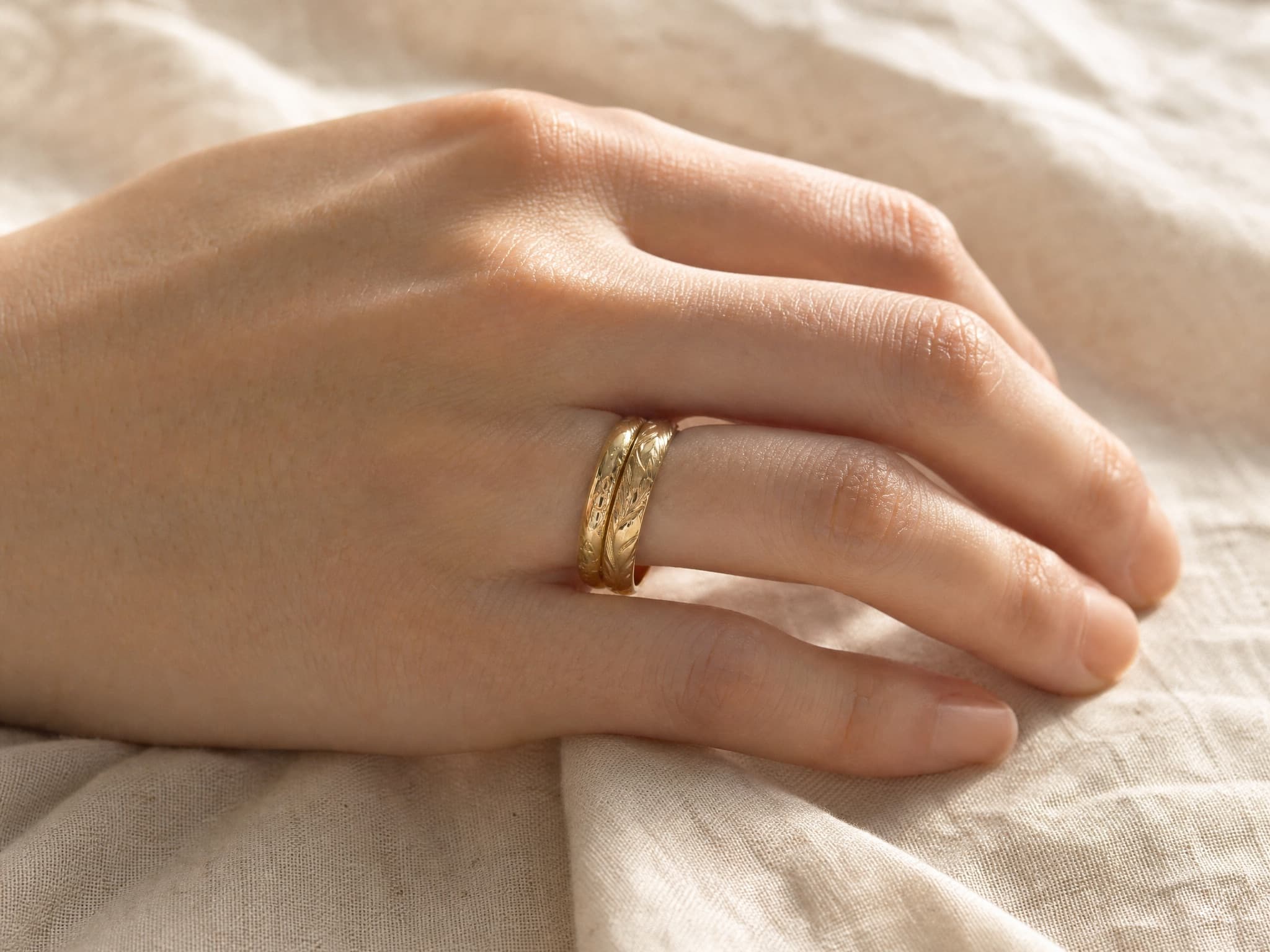 Gold rings on hand
