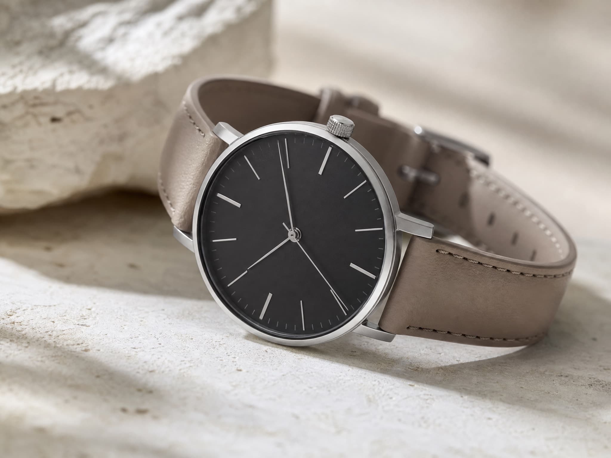 Slim quartz watch on stone